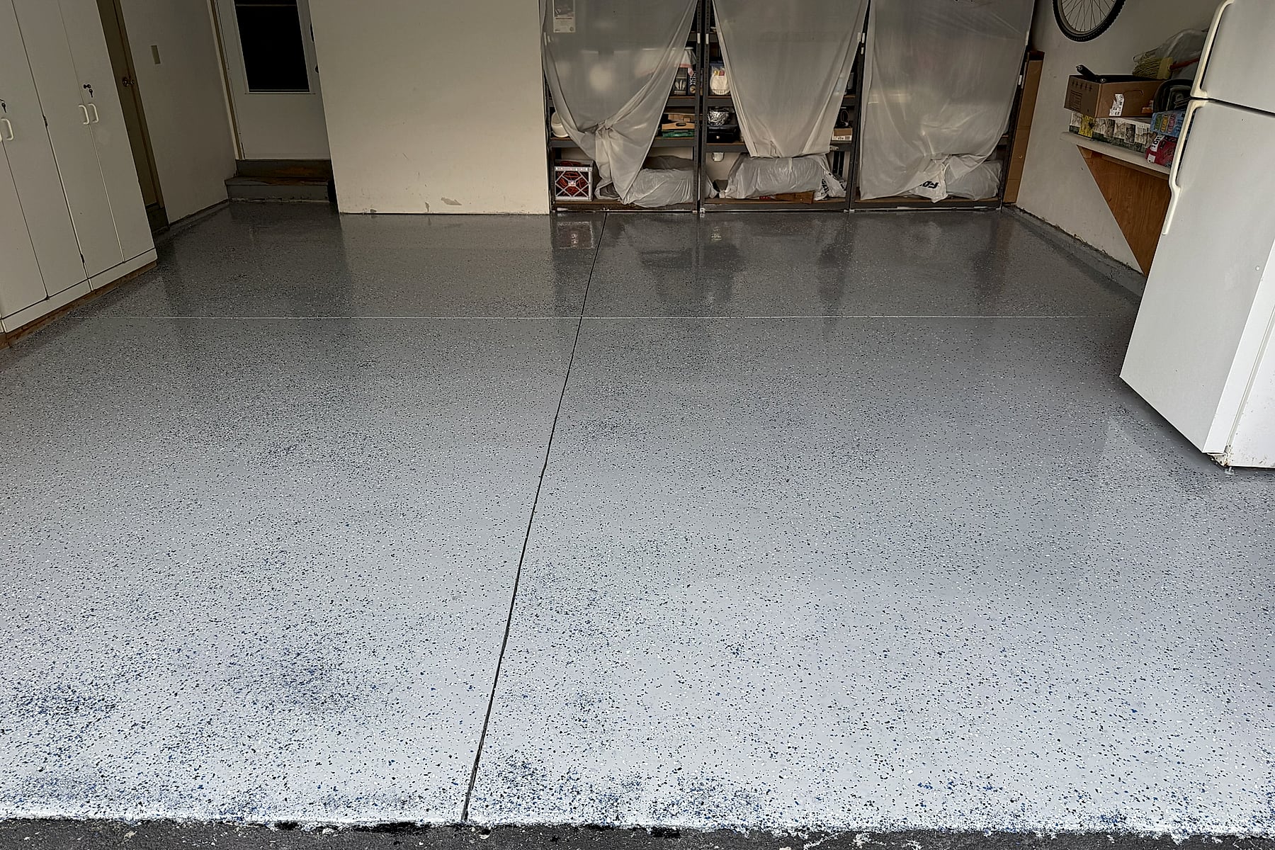 Garage after installation of a full-flake floor coating